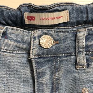 Levi’s 710 Super Skinny Ripped Jeans